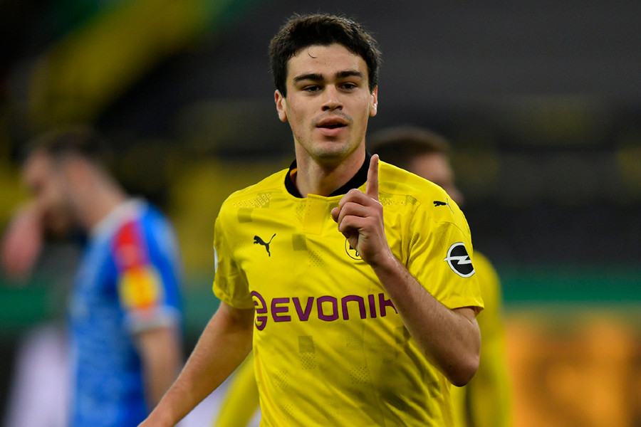 Dortmund's Giovanni Reyna celebrates after scoring his side's opening goal during the German Soccer Cup semifinal match between Borussia Dortmund and Holstein Kiel in Dortmund, Germany, Saturday, May 1, 2021. (AP Photo/Martin Meissner, Pool)